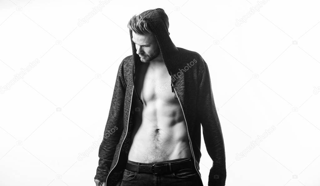 Seductive macho feeling sexy. Unleashed desire. Attractive sexy body. Confident in his attractiveness. Time change clothes. Man handsome sexy undressing. Hipster sexy muscular torso take off clothes