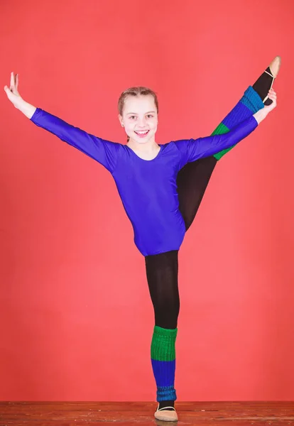 Flexible healthy body. Future star of rhythmic gymnastics. Rhythmic gymnastics sport combines elements ballet dance. Try hard. Girl little gymnast sports leotard. Physical education and gymnastics