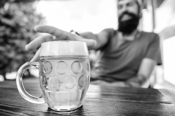 Drinking alcohol including beer. Alcohol free beer. Chilled beer mug on cafe table. Refreshing alcoholic drink or refresher. Alcohol addict sitting in bar. Having alcohol addiction and bad habits — Stock Photo, Image