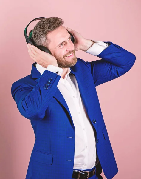 Playlist for office work. Music break during working day. Business man with headphones listening music. Businessman listen music and dance. Music and relax. Man bearded face formal suit enjoy song