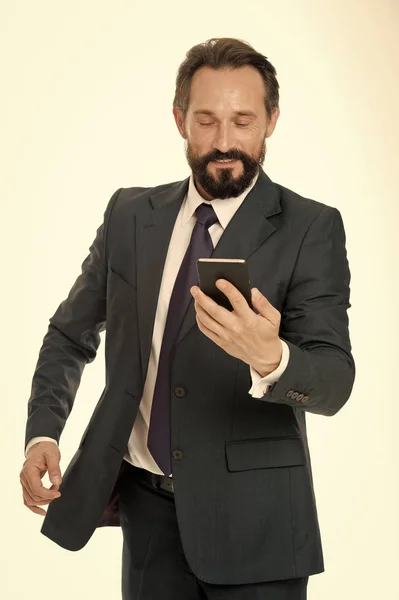 Check email box. Businessman formal suit holds smartphone. Man bearded businessman concentrated on texting with colleague. Checking email or sending message. Mobile internet gives opportunities