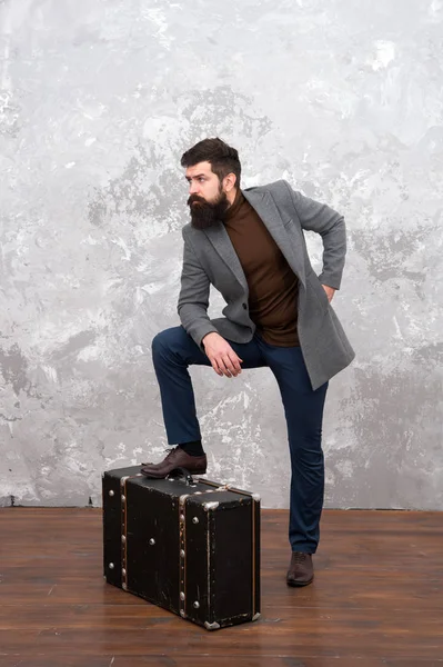 Perfect start of holidays. bag shop. male fashion look. trip adventure. business trip. businessman with suitcase for traveling. vintage and retro style. grunge backdrop. hipster man with travel bag