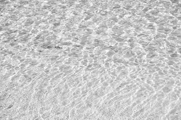 Wavy water background on sand — Stock Photo, Image