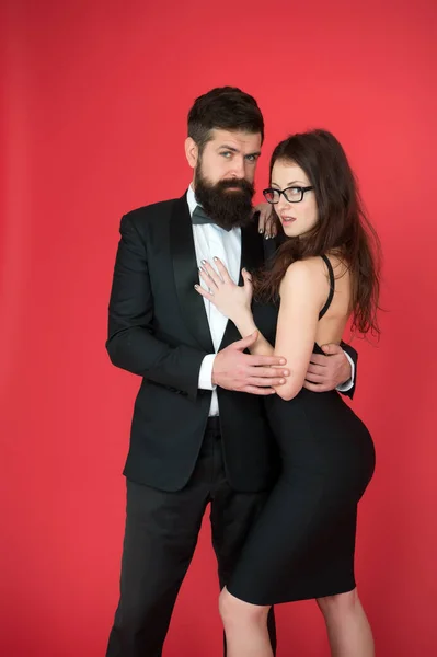 Gentleman and lady. Formal party. Formal gentleman and lady. Couple in love on date. business meetinf of bearded man and woman. esthete. Romantic relationship. bearded gentleman and sexy lady