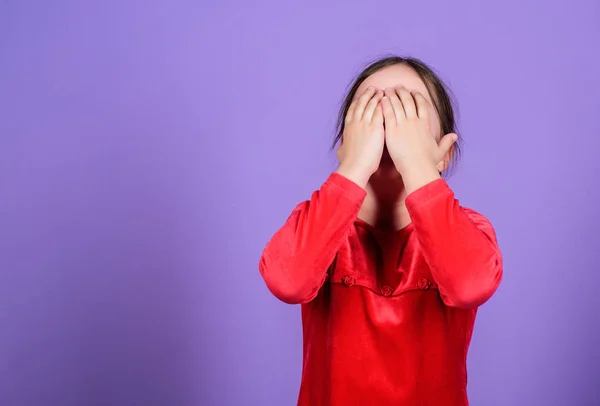 Lost emotional control. Girl little child emotional face expression. Almost mad. Unleashed emotions concept. Desperate baby. Emotional face small girl violet background. Can not stop her feelings