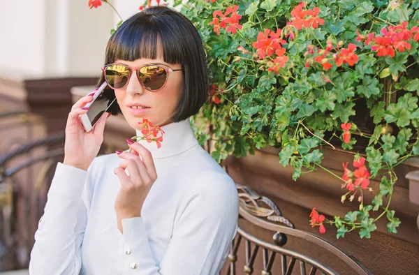 Happy to hear you. Pleasant time and leisure. Relax and coffee break. Woman attractive elegant brunette spend leisure cafe terrace background. Leisure concept. Girl fashionable lady with smartphone — Stock Photo, Image