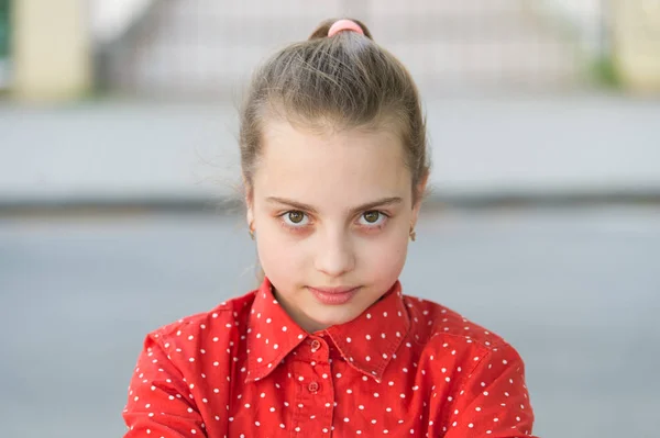 Pretty serious. Girl carefree child. International childrens day. Happiness joy and fun concept. Kid long hair serious face. Summer holidays. How make her smile. Serious child looking at camera — Stock Photo, Image