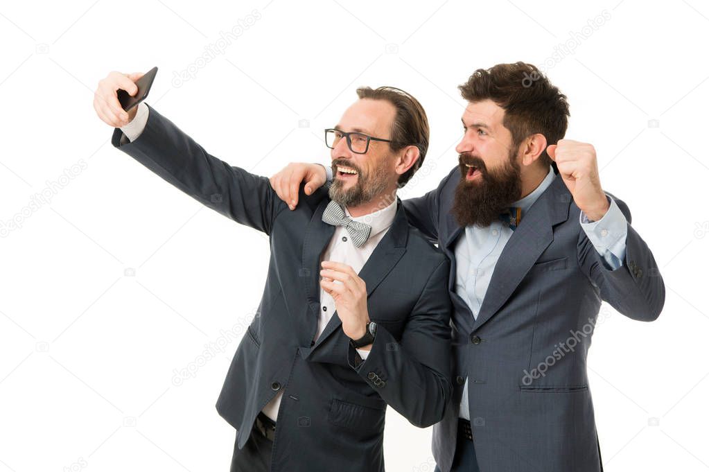 Taking photo with business idol. Business people concept. Men bearded guys formal suits. Business conference famous speaker. Selfie of successful friends. Entrepreneurs taking selfie together