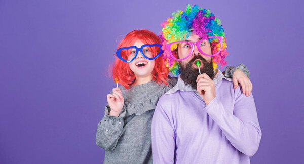 How crazy is your father. Easy simple ways be fun playful parent. Man bearded father and girl wear colorful wig while eat lollipop candy. Thing loving father do for children. Tribute to fun dad