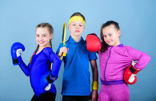 Ready to fight. Team sport success. workout of small girls boxer and boy in sportswear. Happy children in boxing gloves with tennis racket and ball. Fitness energy health. punching knockout