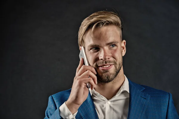 Happy man talk on smartphone. Businessman smile with mobile phone. Business lifestyle concept. Business communication and new technology, vintage