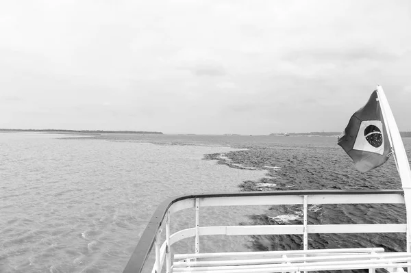 water meeting in brazil -amazon river with rio del negro