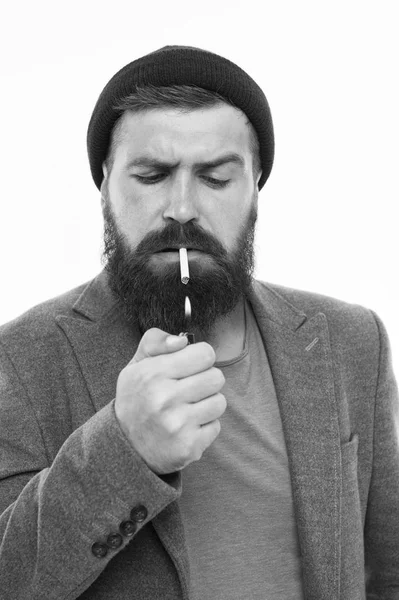 Rugged and manly. Hair and beard care. Mature hipster with beard. Male barber care. Confident and handsome Brutal man. Bearded man. hipster man in hat smoking cigarette. bad habits and addiction