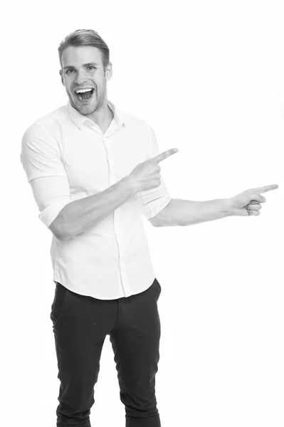 Manager or assistant help find direction. Pointing direction. Man shop assistant pointing index finger isolated on white. Guy handsome shows direction. Look at this advertisement. This way concept — Stock Photo, Image