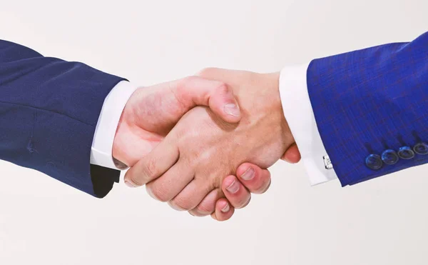 Shaking hands at meeting. Friendly handshake gesture. Handshake after signing profitable agreement. Handshake gesture concept. Partnership commercial deal. Successful deal handshake white background — Stock Photo, Image