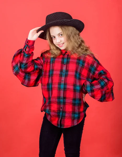 Check out my fashion style. Fashion trend. Feeling awesome in this hat. Girl cute kid wear fashionable hat. Small fashionista. Cool cutie fashionable outfit. Happy childhood. Kids fashion concept
