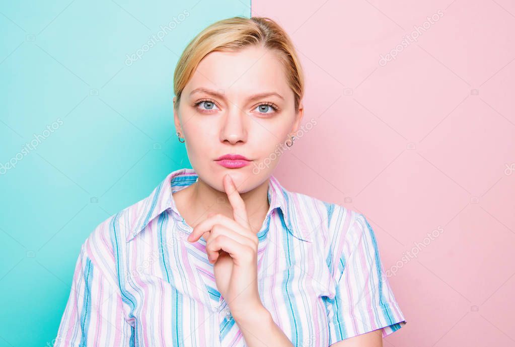 Woman concentrated face finger chin thinking. Need time to make decision. Come up with idea. Thinking about idea. Girl blonde thoughtful face expression close up. Ready to share idea concept