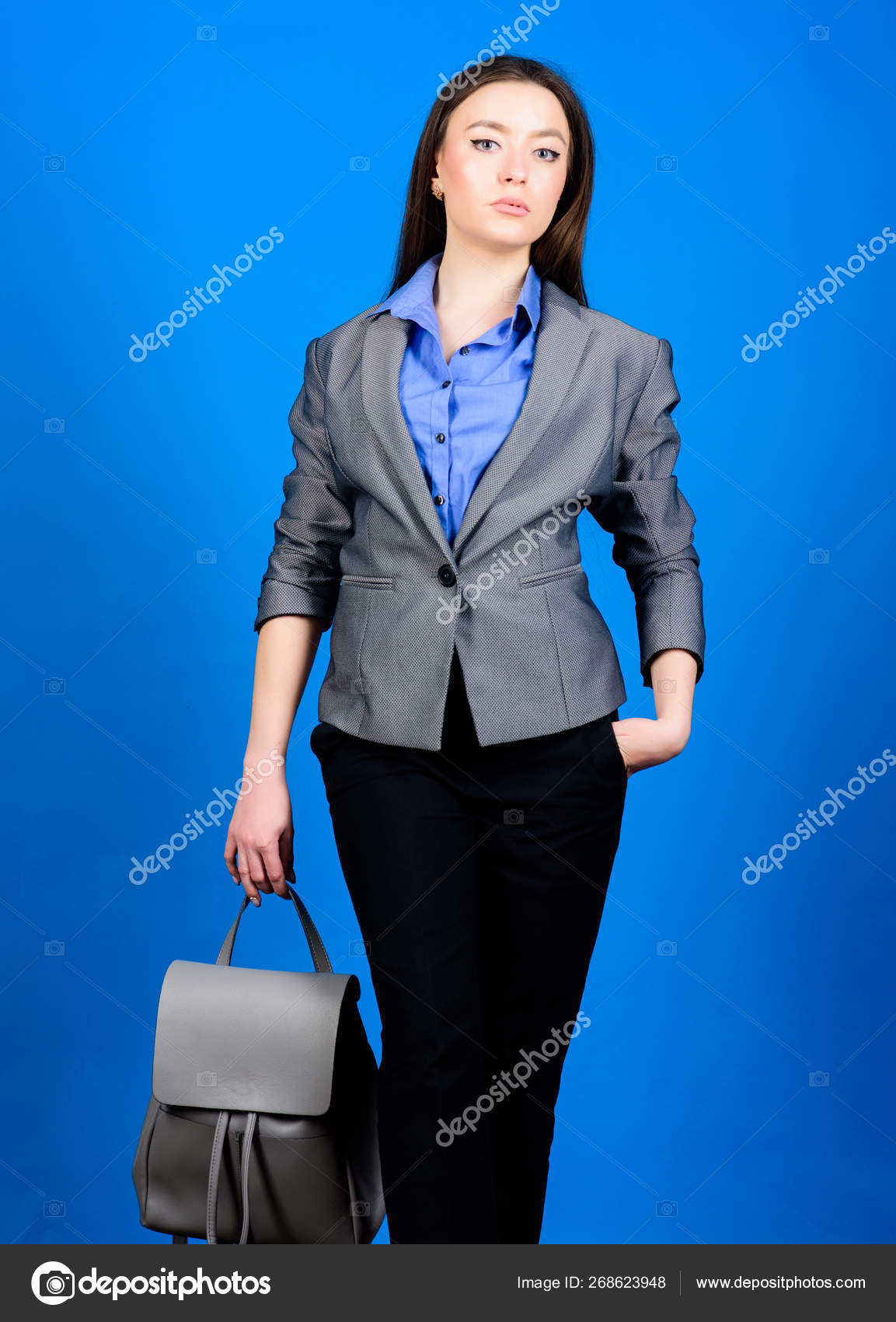 Girl student in formal clothes. business. Shool girl with knapsack. student life. Smart beauty. Nerd. stylish woman in jacket with leather backpack. female bag fashion. You are so smart Stock Photo