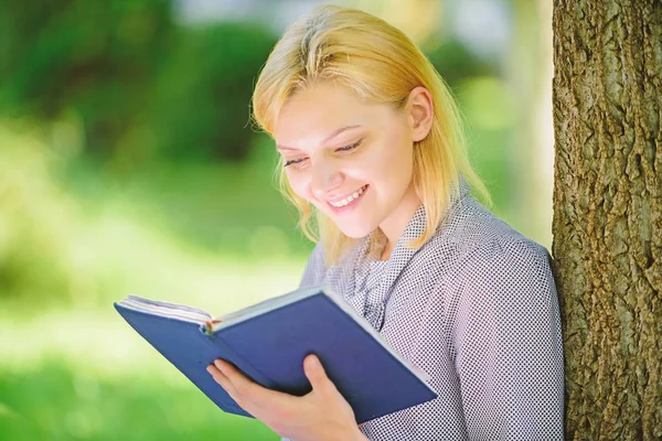 Girl interested sit park read book nature background. Reading inspiring books. Female literature. Books every girl should read. Relax leisure an hobby concept. Best self help books for women