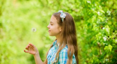 happy child hold blowball. small girl and with taraxacum flower. Natural beauty. Childhood happiness. dandelion. Spring holiday. Womens day. summer vacation. Rancho and country. small girl concept clipart