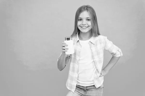 Girl long hair hold plastic bottle with medicines copy space. Add vitamin to your ration. Need vitamin supplements. Most important vitamins and minerals your kid need. Vitamin supplements concept — Stock Photo, Image