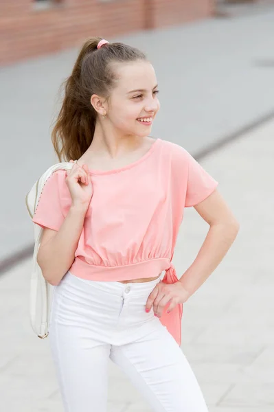Fashion is her life. Fashion look of small vogue model. Adorable girl of fashion on summer day. Fashionable little child in casual fashion on city street — Stock Photo, Image