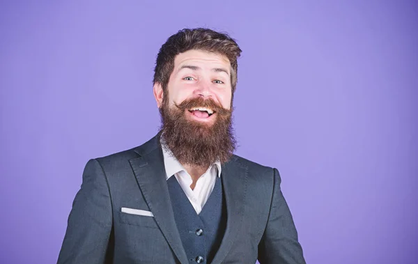Fashion concept. Impeccable style. Businessman fashionable outfit stand violet background. Man bearded hipster wear classic suit outfit. Formal outfit. Elegancy and male style. Guy wear formal outfit