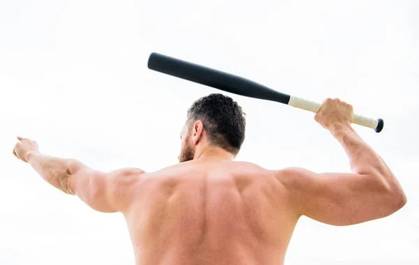 i am a criminal. Hooligan man hits the bat. Bandit gang and conflict. aggression and anger. full of energy. sport game. see the aim. muscular back man isolated on white. man with baseball bat