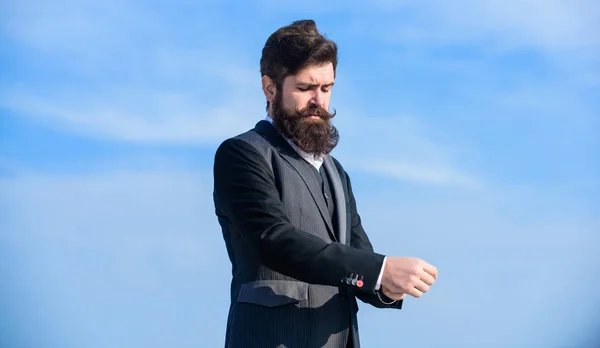 Flawless outfit. Man formal suit adjusting jacket. Male fashion formal menswear. Fashion trend. Guy beard and mustache wear formal clothes. Just right. Businessman bearded face sky background