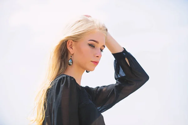 Bleaching roots. Hairdresser tips concept. Salvaged my bleached hair. How to take care of bleached hair. Girl tender blonde makeup face sky background. How to repair bleached hair fast and safely