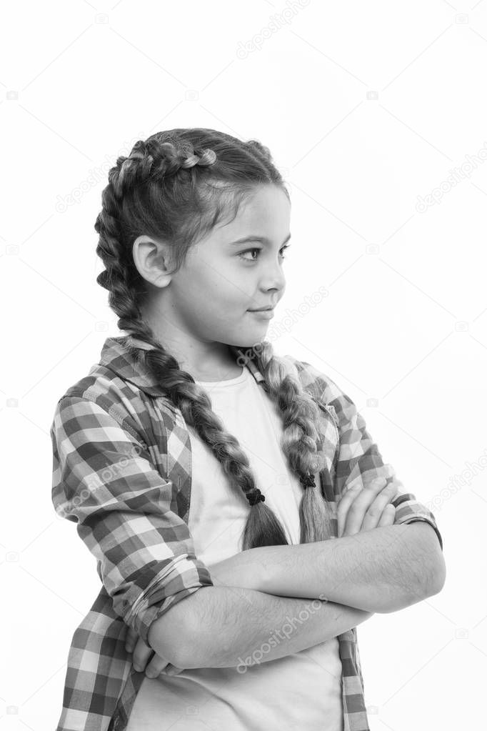 Teenage fashion concept. Fashionable hairstyle. Casual style fashion. Girl confidently crossed arms on chest. Fashion trend. Child little girl colorful braids fashionable hairstyle isolated white