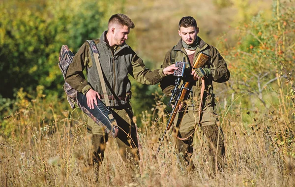 Friendship of men hunters. Military uniform fashion. Army forces. Camouflage. Hunting skills and weapon equipment. How turn hunting into hobby. Man hunters with rifle gun. Boot camp. for success — Stock Photo, Image
