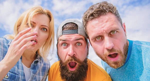Friends shocked faces looking at you. That is impossible. Shocking news. Amazed surprised face expression. How to impress people. Shocking impression. Men with beard and woman looking shocked. No way