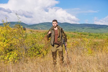 What you should have while hunting nature environment. Hunting equipment and safety measures. Man with rifle hunting equipment nature background. Make sure safe condition. Prepare for hunting clipart
