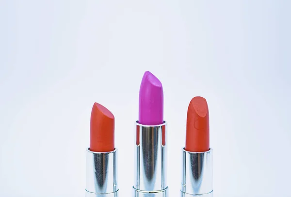 High quality lipstick. Must have. Beauty trend. Daily make up. Lipstick for professional make up. Pick color which suits you. Compare makeup products. Lip care concept. Lipsticks on white background