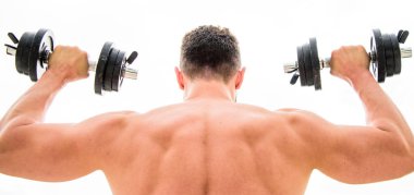 Acı geçicidir, gurur sonsuza dek sürer. Güçlü sırtı ve kolları olan sporcu. Spor ekipmanları. Vücut geliştirme sporu. Spor yaşam tarzı. Halter egzersiz salonu. Dambıl arka görünümü ile egzersiz kas adam