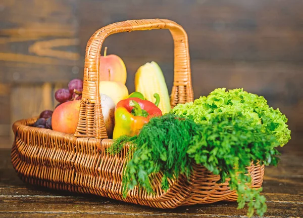 Delivery service fresh vegetables from farm. Buy fresh homegrown vegetables. Excellent quality vegetables. Box or basket harvest vegetables wooden background. Grocery shop concept. Just from garden