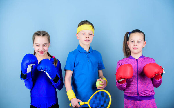 Never stop. workout of small girls boxer and boy in sportswear. Happy children in boxing gloves with tennis racket and ball. Fitness energy health. punching knockout. Team sport success