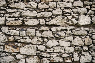 Krakow doku arka planda taşlı duvar eski. Eski arka plan boş duvar taşları Krakow yapılmış. Eski bina malzeme kavramı. Antik taşlı sur veya savunma parçası