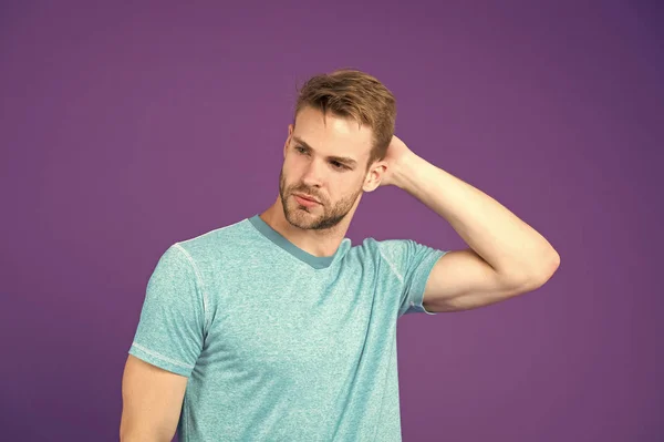 Simple hacks to make hairstyle better. Use right product styling hair. Confident with tidy hairstyle. Barber hairstyle tips. Man bearded guy think which hairstyle he likes today on violet background