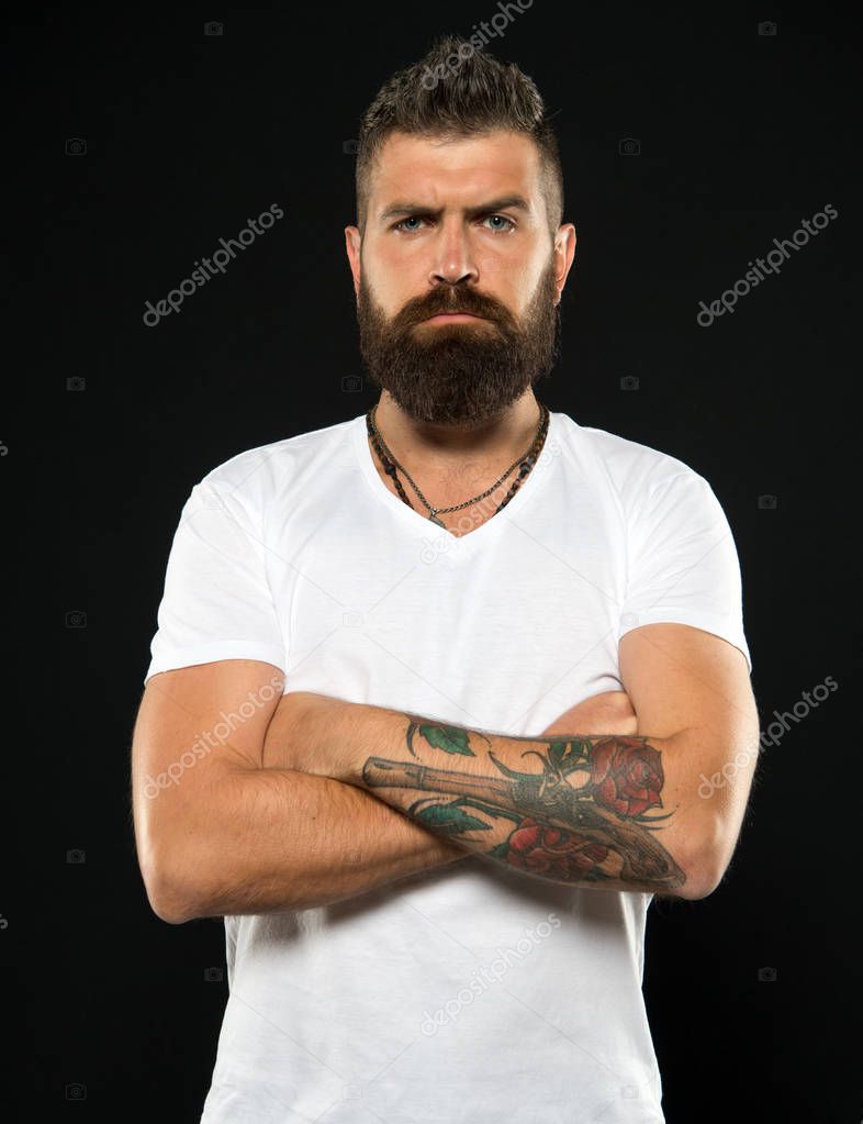 Beard fashion and barber concept. Man handsome hipster stylish beard and mustache. Barber tips maintain beard. Styling and trimming beard care. Beauty and masculinity. Bearded confident hipster
