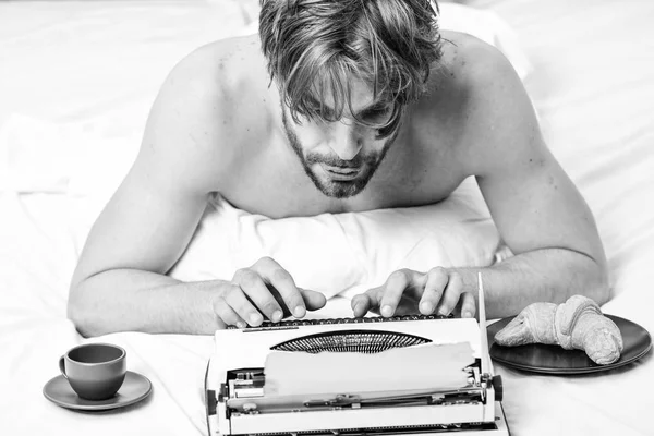 Man typing retro writing machine. Male hands type story or report using vintage typewriter equipment. Writing routine. Old typewriter on bedclothes. No day without chapter. Vintage typewriter concept — Stock Photo, Image