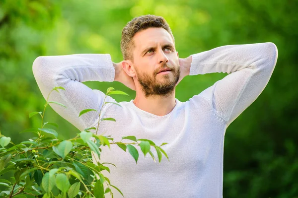 dreaming man in forest. daydreamer. ecological life for man. man in green forest. morning in nature. healthy lifestyle. nature and health. mature fashion model. macho man. Spending great time.