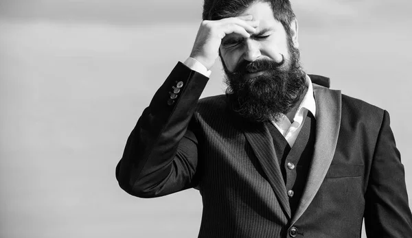 Business failure. Man bearded stressful painful face sky background. Guy suffer headache stressful day. Stressful business. Pain and migraine. Frustration and disappointment. Unforgivable mistake