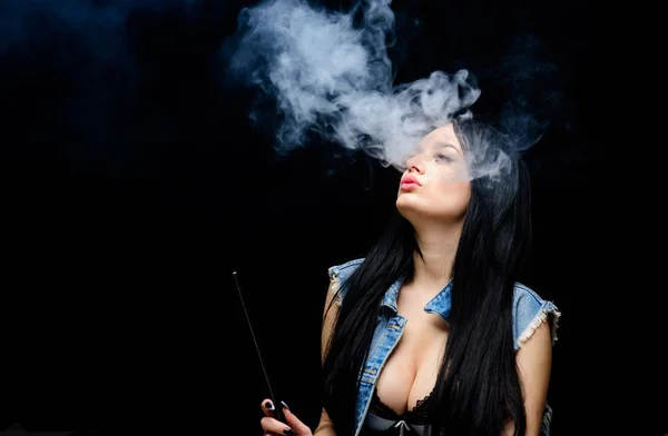 Vaping is sexy. Fashion girl vaping. Relaxing with hookah. Nicotine addiction. Attractive busty brunette smoking vaping device. Girl vaping. Hookah bar. Electronic cigarette. White cloud of smoke — Stock Photo, Image