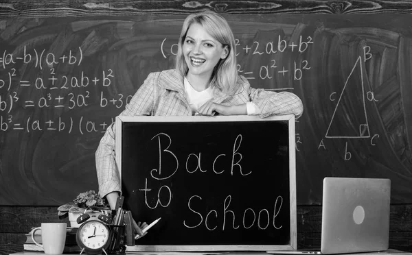 School. Home schooling. happy woman. teacher with alarm clock at blackboard. Back to school. Teachers day. woman in classroom. Study and education. Modern school. Knowledge day. Living in digital age — Stock Photo, Image