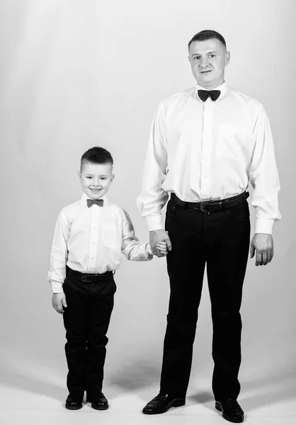 Event manager. male fashion. parenting. fathers day. small boy with dad businessman. family day. father and son in formal suit. happy child with father. business meeting party. tuxedo style — Stock Photo, Image