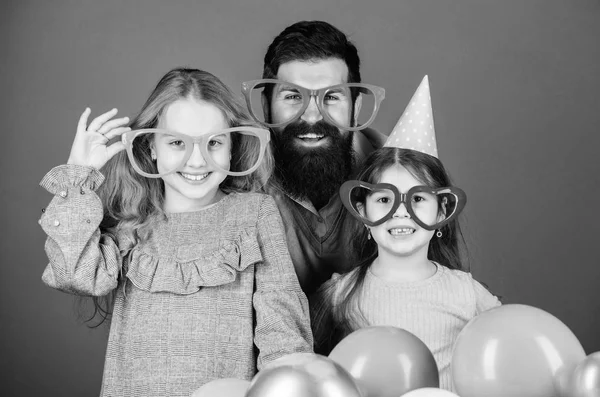 Fancy party. Family of father and daughters wearing party goggles. Family party. Happy family celebrating birthday party. Father and girl children enjoying time together. Having a family celebration — Stock Photo, Image