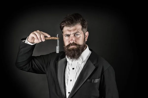 Sharp blade. Grow mustache. Growing and maintaining moustache. Man with mustache. Beard and mustache grooming. Hipster handsome bearded wear tuxedo. Barber shop concept. Shaving dangerous blade — Stock Photo, Image