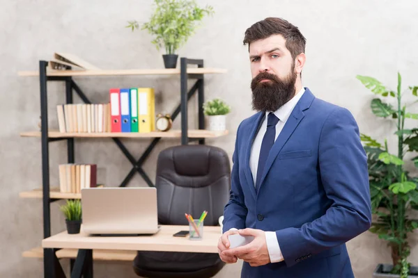 Bearded hipster top manager hold card. Banking services. Guy formal suit stand in office. Businessman hold blank card. Finance and accounting. Easy and quick payment. Bank card. Financial support
